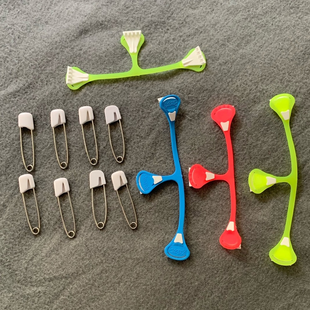 Snappi cloth diaper fasteners